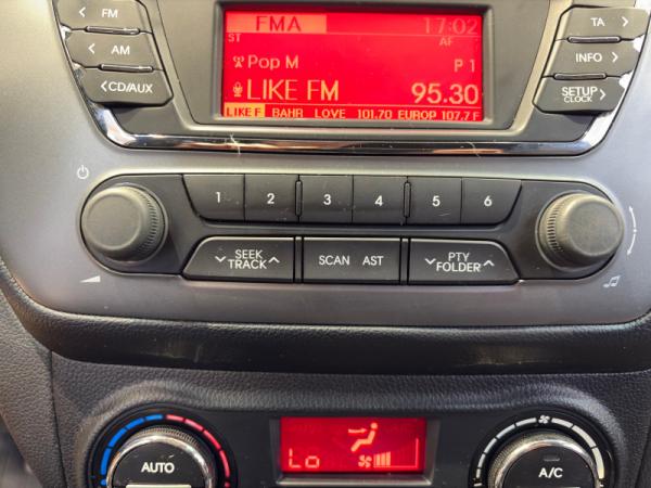 Kia Rio, III